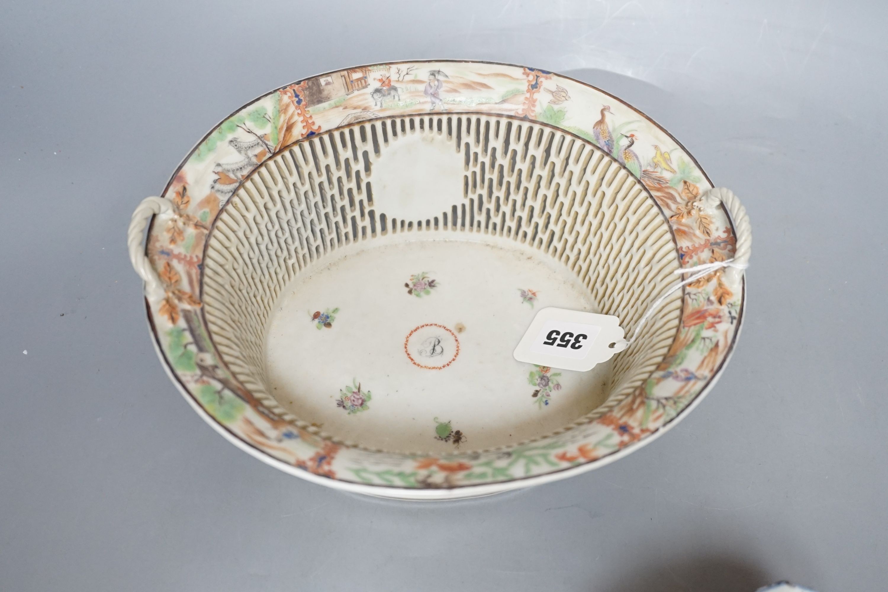 A late 18th century Chinese export famille rose chestnut basket, 27cm long, and a Chinese Imari tea caddy (2)